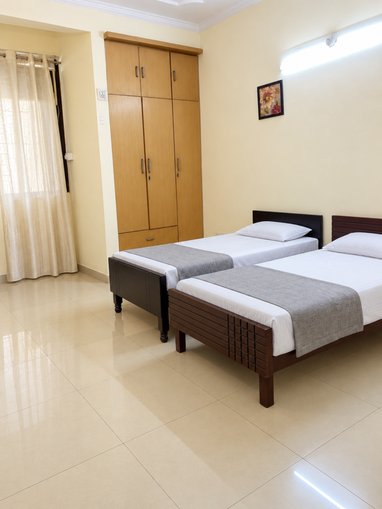 Two-bed room at GableStay Girls PG in Sector 33, Noida